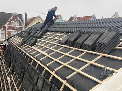 Dakreparatie in Amsterdam Loodgieter Amsterdam.eu team